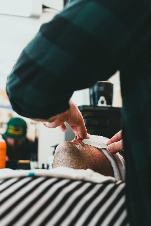 Hot towel shave with a straight razor